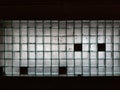 Texture background wall made of many glass cubes with black fields