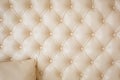 Texture beige leather sofa upholstery. Royalty Free Stock Photo