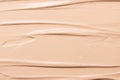 Texture of beige liquid creamy foundation close-up. Caring moisturizing nude BB cream. Natural mineral cosmetics, beauty