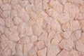 The texture of a beige old stone wall made of large stones close-up Royalty Free Stock Photo