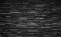 Texture of black brick slate wall, dark grey stone Royalty Free Stock Photo