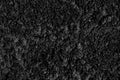 Texture of black carpet with long pile. Close up Royalty Free Stock Photo