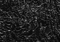 Texture of black crushed eyeliner or black acrylic paint