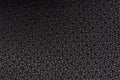 The texture of the black fabric of the chair close up