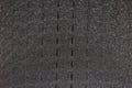 Texture of the black foam rubber surface in selective focus Royalty Free Stock Photo