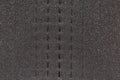 Texture of the black foam rubber surface in selective focus Royalty Free Stock Photo
