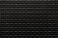 Texture of black metal wall centipede pattern, abstract background