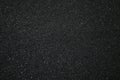 Texture of black sandpaper close-up. Small parts