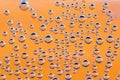 Texture of blue airbubbles on orange backroud Royalty Free Stock Photo