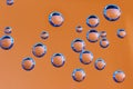 Texture of blue airbubbles on orange backroud Royalty Free Stock Photo