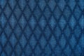 Texture of blue fabric with rombic pattern