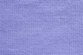 Texture of blue violet wool knitted sweater close-up. Abstract stockinette fabric background in trendy color of the year 2022 very Royalty Free Stock Photo