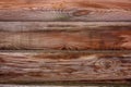 The texture of the boards of an old wooden fence closeup. Old wooden planks background Royalty Free Stock Photo
