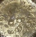 Texture of boiling liquid similar to gold