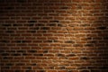 Texture of a brick wall with a light spot. Nature Royalty Free Stock Photo