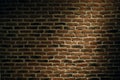 The texture of a brick wall with a light spot. Abstract. Royalty Free Stock Photo