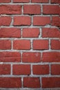 Texture of a brick wall made of red bricks bonded with cement mortar Royalty Free Stock Photo