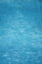 The texture of the brick wall of many rows of bricks painted in blue color Royalty Free Stock Photo