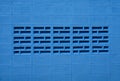 The texture of the brick wall of many rows of bricks painted in blue color  Background. Royalty Free Stock Photo