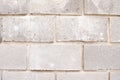 The texture of the bricks. Brick background. Background of bricks. Gray bricks. Concrete blocks. Part of the concrete wall. Gray Royalty Free Stock Photo