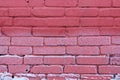 texture of bright red brick wall on a frost day.