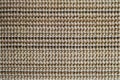 Texture of brown-beige jute material carpeting