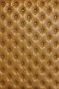 Texture of brown beige leather background with capitone pattern, full-frame. Brown retro Chesterfield style. Royalty Free Stock Photo