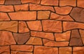 Texture of brown and black stone blocks closeup. Old brown bricks. The background wall has a beautiful pattern. The dark color of Royalty Free Stock Photo