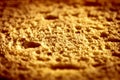 texture brown bread as close up background. backdrop of rough dappled textured surface crusty toasted slice of white loaf or sandw Royalty Free Stock Photo