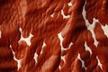texture of brown cow leather with spots with seamless pattern. Genuine natural animal skin Royalty Free Stock Photo