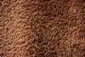 Texture of a brown faux fur as a background