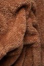 Texture of a brown faux fur as a background Royalty Free Stock Photo