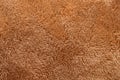 Texture of brown fluffy soft plush fabric
