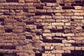 Texture of brown old brick. Background broken brickwork. Broken brown brick with Royalty Free Stock Photo