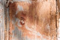 Texture of brown old shabby wood wall with peeling and cracked paint Royalty Free Stock Photo