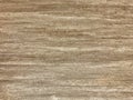 Texture of brown wallpaper with a pattern. Beige paper background