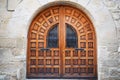 Geometric brown wood antique door and glass windows