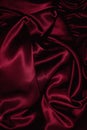 Texture of burgundy satin close up Royalty Free Stock Photo