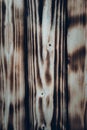 Texture of Burnt black and brown wooden planks Royalty Free Stock Photo