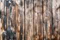 Texture of burnt old wood. dark brown background for your text. wall after fire Royalty Free Stock Photo