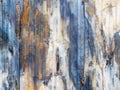 The texture of a burnt sheet of iron. Background with rust and soot on the metal. Metal corrosion. Traces of fire on the wall of