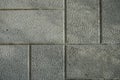 The texture of cement floor tiles. Rough surface with particles of sand and debris. Royalty Free Stock Photo