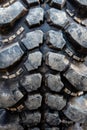 The texture of Centipede pattern mud terrain tire Royalty Free Stock Photo