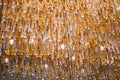 Texture. Chandelier with glass hanging elements of different colors. Decoration