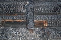 Burned wooden charred log house texture. closeup Royalty Free Stock Photo