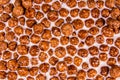 Texture of chocolate cereal balls in milk for the background Royalty Free Stock Photo