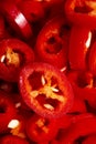 The texture of chopped chilli peppers as a background. A close shot of a chilli pepper. Macro photo. Fresh chopped chili peppers. Royalty Free Stock Photo