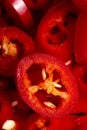The texture of chopped chilli peppers as a background. A close shot of a chilli pepper. Macro photo. Fresh chopped chili peppers. Royalty Free Stock Photo
