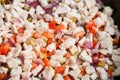 The texture of chopped vegetables and dietary white meat in a frying pan. Roasting poultry meat Royalty Free Stock Photo