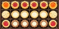 Texture close-up, mix cookies in box. round biscuit cookies with various fillings. Packing cookies Royalty Free Stock Photo